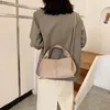 Bolsas de cintura nicho francês Khaki Bag Bucket Spring/verão 2024 Bolsa de moda versátil Ins simples Ha simples feminina