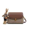 Tas dames 2024 Crossbody high -end licht luxe duizend vogelrooster kleine vierkante enkele schoudertassen