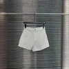 Kvinnors shorts designer 2024 tidigt vår Ny Nanyou cha mode mångsidig bokstav broderad metallkedja diamantnät tvätt denim t1mw