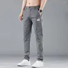 Pantalon masculin élastique élastique mince décontractée douce coréenne coréenne coton extensible des affaires de commerce masculin gris boussière bleu