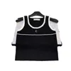 Tanques femininos Camis Designer 2024 Primavera/verão novo xiaoxiang estilo preto e branco no pescoço redondo tampa de malha para fit slim fit sem mangas diamante e4pp