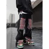 Pantalon masculin de style américain Hip Hop Skateboard Straight décontracté jeans lâches High Street Hole Patch Typers