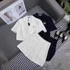 Designer de vestido de duas peças Conjunto de moda da primavera Elegante e Slim Triângulo Casa Casa Curta Salia Planejada 73VM