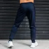 Hosen 2022 Neue Männer, die Hosen Eis Seide Elastizität Sommer schnell trockene Training Fitness Reißverschluss Pocket Jogging männliche Fitnessstudio Jogginghosen