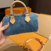 2024 Nuevo diseñador de mezclilla bolsa de hombro bolso bolso cruzado bolso bolso bolso de compras de la moda bolso de mujer bolso de cluth homo