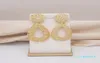 Дизайнер ожерелья серьги K Store 2021 EST Fashion African Dewelry Set для женщин золотой серебряный цвет серебряный цвет подвесной 6502551