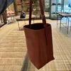 O designer de bolsa de marca vende bolsas femininas a 65% de desconto de couro para mulheres bolsa nova fivela sofisticada Bucket versátil de grande capacidade