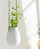 Strona główna Balkon Balkon Ceramic wiszący wazon wazonowy wazon roślin z sznurkiem Little Bottle Home Decor3423335