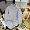 Chemises décontractées pour hommes chemises en coton élastique de haute qualité masculines à manches longues poche pour les vêtements de créateurs minces miennes A65
