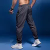 Брюки Bintuoshi Новые спортивные брюки Мужчины брюки с застежкой на молнии