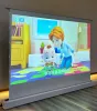 72 inch wit projectiescherm 16: 9 draagbare vloer stijgende pull-up scherm elektrisch tabbladgespannde vloer stijgend projectorscherm