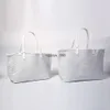 Bolsa de designer de bolsa de sacola Bola feminina Bolsa de alta qualidade Bolsa de couro casual Bolsa de compras para mãe de grande capacidade