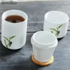 Tazze di piattini set da tè in ceramica tazza da tè in porcellana bianca con coperchio e filtro per ufficio portatile tazza di viaggio per tazza da viaggio.