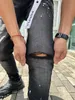 Mor kot pantolon kot tasarımcı kot pantolon erkek skinny jeans lüks tasarımcı kot pantolon sıkıntılı yırtık bisikletçi siyah mavi jean slim fit motosiklet