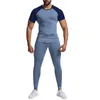 Pantalon pour hommes Vêtements d'été Elastic Sweat Training Running Exercise Fitness Fitness T-shirt solide et streetwear mince pour l'homme
