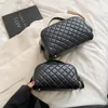 Bolso de maquillaje de cuadrícula de alta calidad para mujeres cosméticas de cuero Almacenamiento de viajes grandes con cremallera de diseño negro de tocador