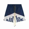 شورت Rhude Mens Designer Summer Summer Fashion Sports Shorts Mens Beach Shorts عالية الجودة شارع Hip Hop Style Multi Style Shorts US Size S-XL