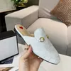 Klassische Frauen flache Kleiderschuhe 100% authentische Kuhleder -Metallschnalle Frauen Leder Freizeitschuhe Mule Männer Druck Trampel Fauler Slipper groß