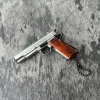 Keychains 1pc New Antistress Toys Metal Pistol Gun Keychain Miniature Model 1:3 Beretta 92f Colt 1911 Glock 17 Birthday Gifts for Men