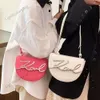 Lüks turuncu karl lagerfield eyer çanta moda koltuk altı çanta tasarımcısı sevimli tüm eşleştirme Kore omuz crossbody çanta yeni stil kadın haberci çanta