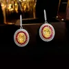 Boucles d'oreilles étalons européens et américains jaunes diamant ovale 925 argent incrusté de diamants à haute teneur en carbone haut de gamme polyvalent