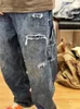 Pantaloni maschili profilo di bordi strappato vintage jeans alla moda hip hop skateboarding