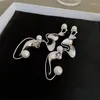 Boucles d'oreilles en peluche xialuoke metal distorsion irrégulière pour les femmes de la personnalité de la mode