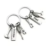 50pcslot Nytt rostfritt stål Dadverktyg Keychain Morfar Hammer Skruvmejsel Keyring Father Day Gifts1 85 W26621139