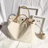 Embrulhado de presente 100pcs/lote de loto personalizado Cotton Tote Sagra com couro alça de alta qualidade de grande capacidade Mulheres em branco praia