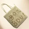 2024 New Letter Woven Bag Single Shoulder Beach Grass Woven Bag Simple and Elegant 240412