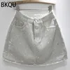 Rokken BKQU 2023 Nieuwe Rhinestone Denim Mini Skirts Women Fashion Party Club Diamonds High Taille Jean Rok Y2K Aesthetic Koreaanse bodems T240412