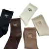 Chaussettes café hosiery colorés pour enfants Instagram à la mode brodée Bird High Rubber Sports automne d'hiver Version coréenne féminine Coton Mid Longueur