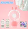 1pcs tragbarer Handheld USB -Fan Mini Cartoon Kaninchenbär luminöser farbenfroher wiederaufladbarer Lüfter für Reisebüro -Studenten Schlafsaal FO7195674