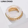 Bärade strängar Chiao 2021 Trendiga 6 stycken Multi Lager Layering Stapled Pearl Gold Ball Pärlade armband Set2670