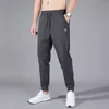 Мужские брюки Элегантная мода Harajuku Slim Fit Ropa Hombre все совпадают с потом свободные карманы.