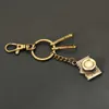 Nyckelringar Wannee Fashion Mini Retro Bronze Metal Car Key Chain Multi Cameras String Stylish Keychain Men Pendant Creative Gift Jewelry 240412