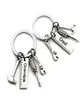 50pcslot Novo aço inoxidável Dad Tools Keychain Vovão Hammer Chave de fenda Keyring Padre Gifts1 85 W22099378