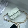 Yüksek kaliteli çanta tasarımcısı çanta gerçek deri kuzu derisi altın zincirleri mini inci mesleği çanta bayan omuz crossbody klasik flep kadın çantalı çanta çanta x185