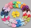 50 stcs lot Polka dot lint haarbogen met clip boutique haarbakken babymeisjes haaraccessoires273M8446030