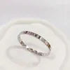 Cartes 18k bracelet en or rose femelle femelle incolore diamant complet un clou un diamant couple bracelet en acier titane lot mixte