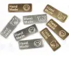 30 stcs 40x15 mm zilver/gouden beer smile patroon lederen reliëf labels labels naaien accessoires diy kleding knutselen handgemaakt tag
