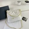 Diseñadores de bolsos vendedores calientes bolso popular versátil nueva cadena de cuadrícula Crossbody cubo