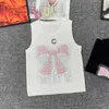 Serbatoi da donna Designer CAMIS Xiaoxiang Industria pesante farfalla rosa Butterfly Diamond Auto Hot Auto Tround Roloso Pullover a maglia canotta senza maniche Top 24SS Summer JH8H