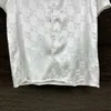 Camisa de diseño de lujo de moda y ajuste suelto para hombres camisas hawaii camisas casuales hombres vestidos de manga corta camiseta hawaiana en blanco y negro