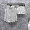 Diseñador de pantalones de dos piezas para mujeres Primavera y verano NUEVA Moda de estilo simple y casual Camiseta suelta bordada shorts para mujeres ou9f