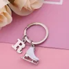 Nyckelringar Fishhook Ice Skate Shoes Key Chain Ring Zircon Crystal Keychain Luxury Initial Letter Pendant Emamel Present For Woman Man Jewelry 240412