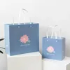 Presentförpackning 500 st/parti grossistanpassad logotyp påse papper shopping för butiksbutik juvelerhalsbands ring lyx