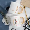 Tasses créatives de lait en céramique tasse d'amour motif de tenue de tenue de tenue dorée compliquant la poignée tasse de bureau de bureau de café ménage décoration de la maison