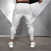 Spodnie nowe męskie spodnie do biegania spodnie dresowe joggery 2022 Wiosna męska drukarnia siłownia fitness długie spodnie sportowe spodnie dresowe