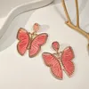 Dingle örhängen 2024 Böhmen rotting stickad handgjorda vävda fjäril för kvinnor flickor färgglada metall geometriska